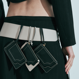 Cartera Binomio de piel negra con cremallera