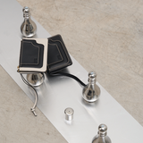 Cartera Binomio de piel negra con cremallera