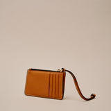 Cartera Binomio de piel caramelo claro con cremallera